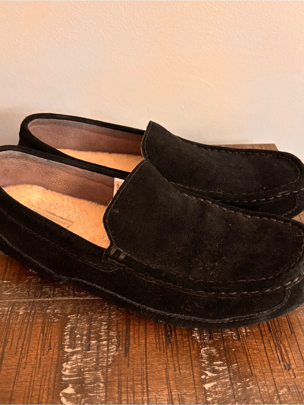 UGG Men's 10 Alder slippers crafted in black suede with a classic moc-toe stitch